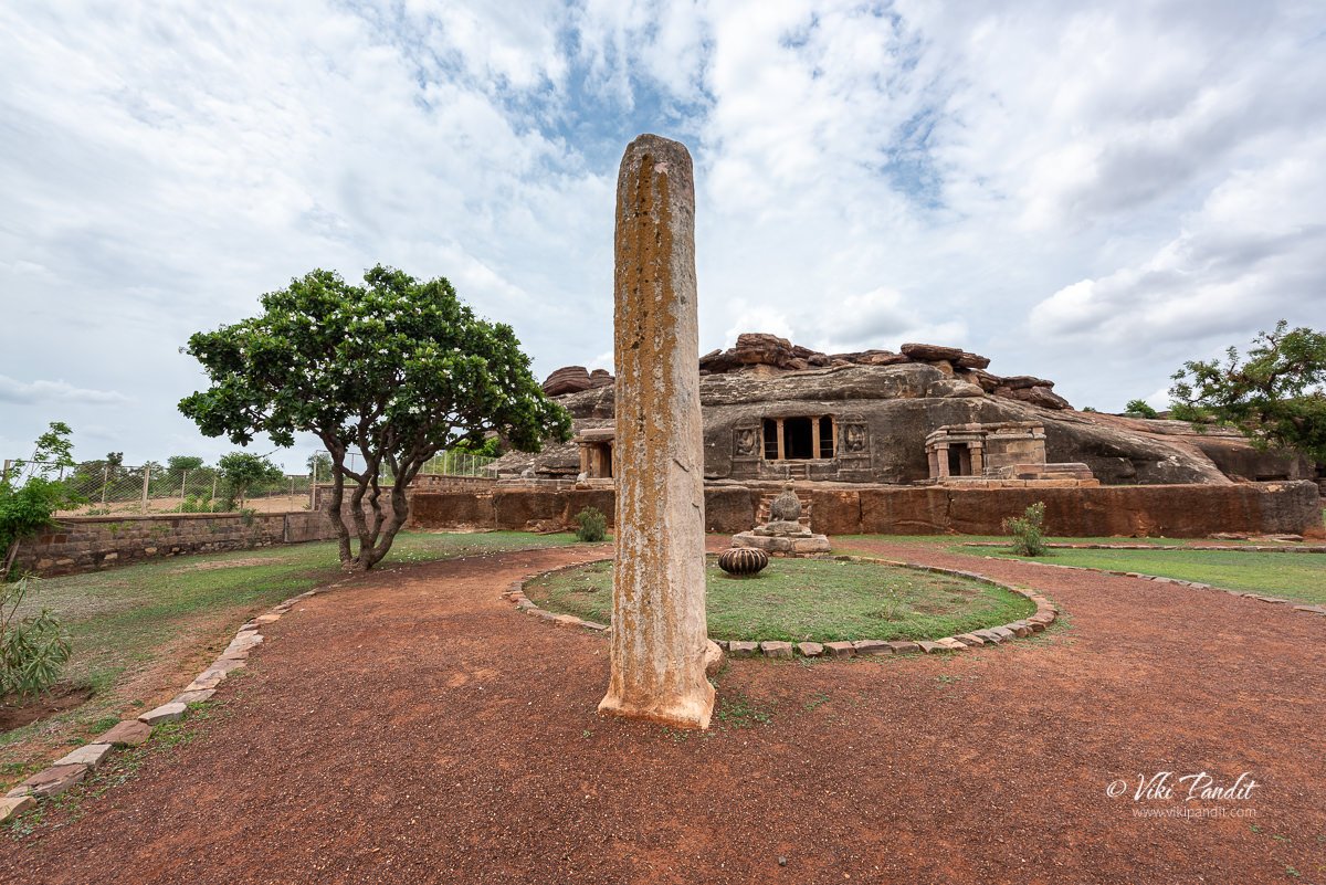 Monolith stone pillar outside the Ravana Phadi Cave Temple