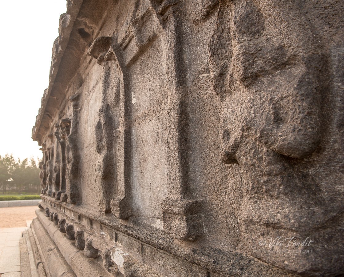 Eroded carvings on outer wall of Shore Temple