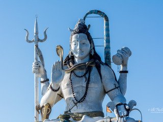 The 108 feet statue of Lord Shiva encircled and supported by a girdle of twelve Jyotirlingams at Chardam in Namchi